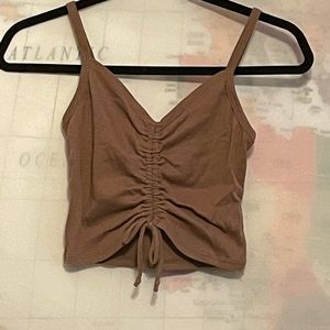 Tilly’s mini tank size small lightly worn. No damage. Brown